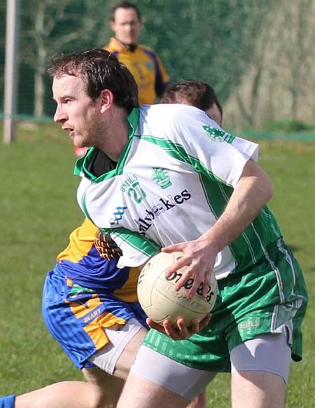 Action from the division three football league match against Burt.