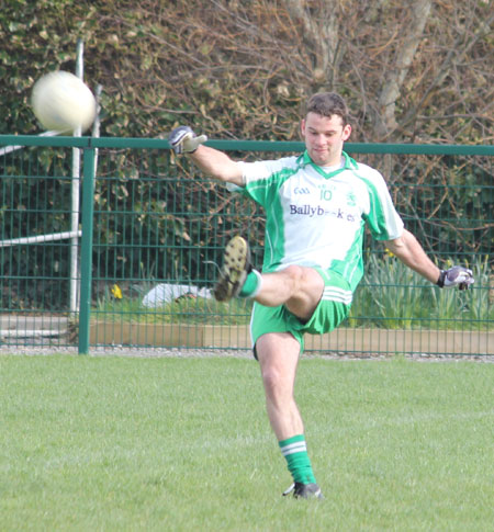 Action from the division three football league match against Burt.