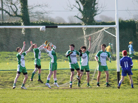 Action from the under 16 league game against Four Masters.