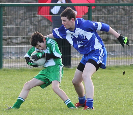 Action from the under 16 league game against Four Masters.