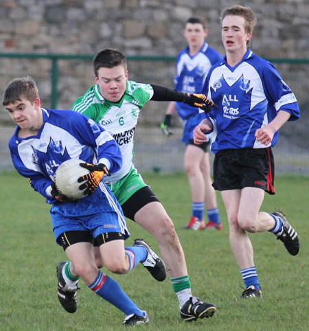 Action from the under 16 league game against Four Masters.