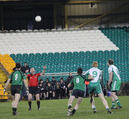 Action from the division three football league play-off match against Naomh Bríd.