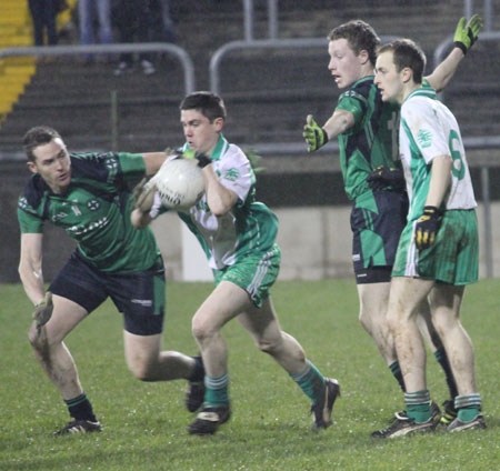 Action from the division three football league play-off match against Naomh Bríd.