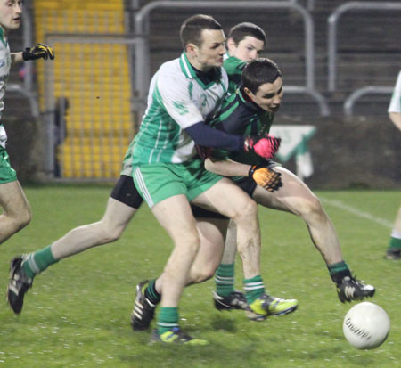 Action from the division three football league play-off match against Naomh Bríd.