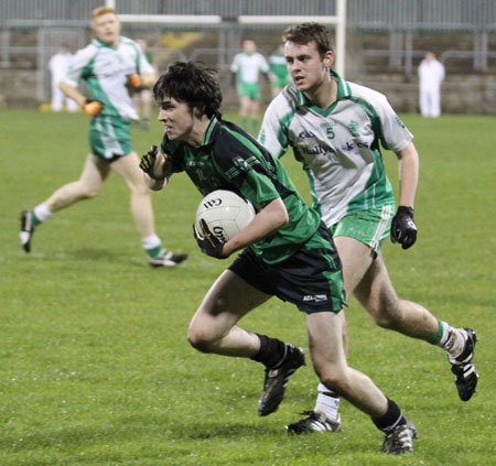 Action from the division three football league play-off match against Naomh Bríd.