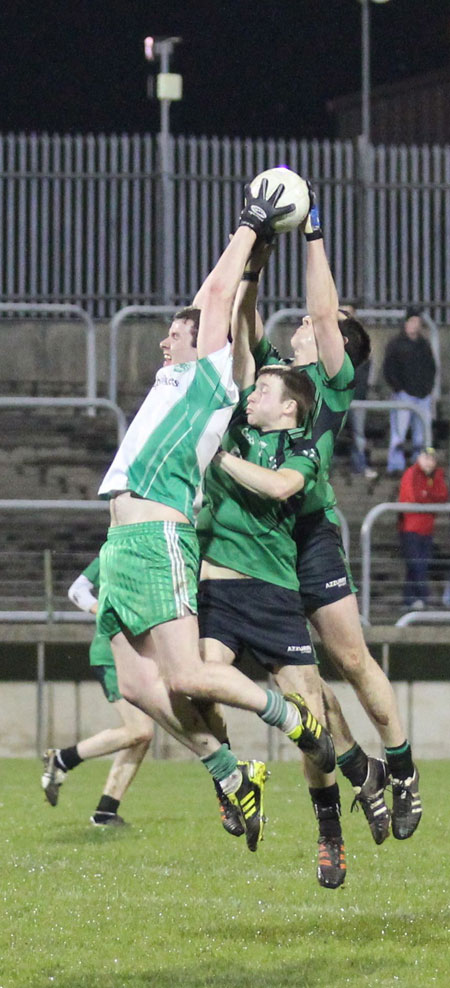 Action from the division three football league play-off match against Naomh Bríd.