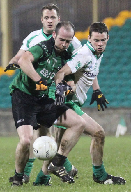 Action from the division three football league play-off match against Naomh Bríd.