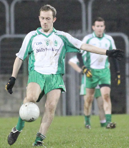 Action from the division three football league play-off match against Naomh Bríd.