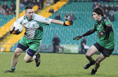 Action from the division three football league play-off match against Naomh Bríd.