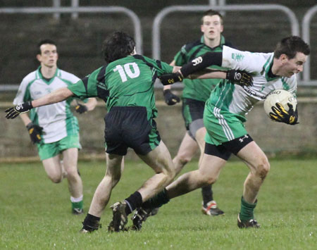 Action from the division three football league play-off match against Naomh Bríd.