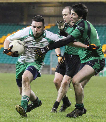 Action from the division three football league play-off match against Naomh Bríd.