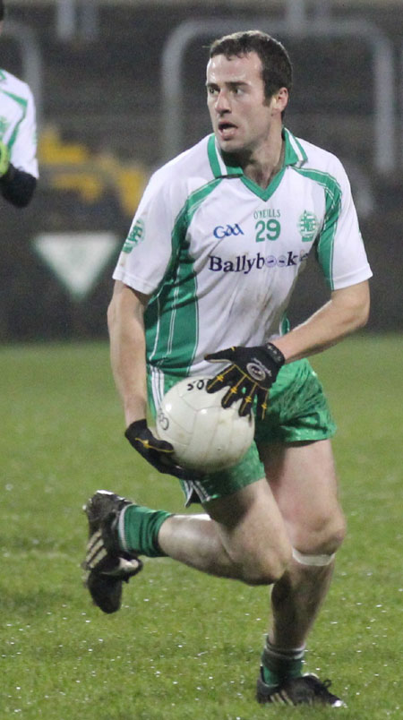 Action from the division three football league play-off match against Naomh Bríd.