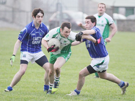 Action from the challenge match against Devenish.