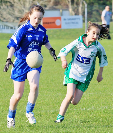 Action from the 2012 ladies under 14 match between Aodh Ruadh and Four Masters.