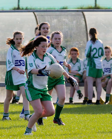 Action from the 2012 ladies under 14 match between Aodh Ruadh and Four Masters.