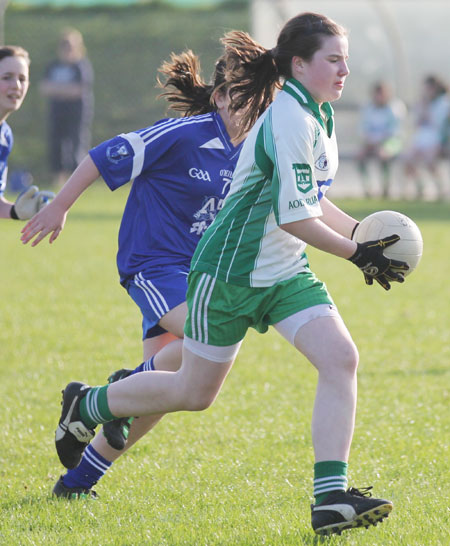 Action from the 2012 ladies under 14 match between Aodh Ruadh and Four Masters.