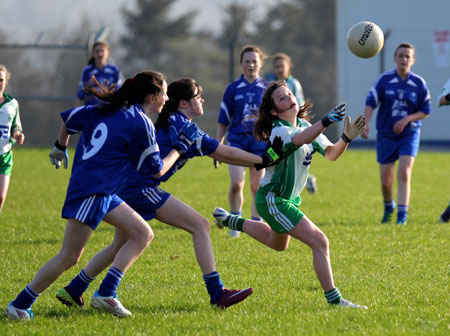 Action from the 2012 ladies under 14 match between Aodh Ruadh and Four Masters.