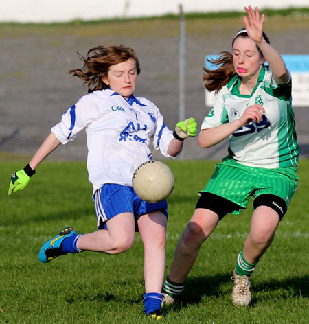 Action from the 2012 ladies under 14 match between Aodh Ruadh and Four Masters.