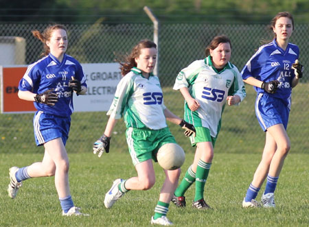 Action from the 2012 ladies under 14 match between Aodh Ruadh and Four Masters.