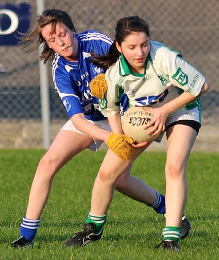 Action from the 2012 ladies under 14 match between Aodh Ruadh and Four Masters.