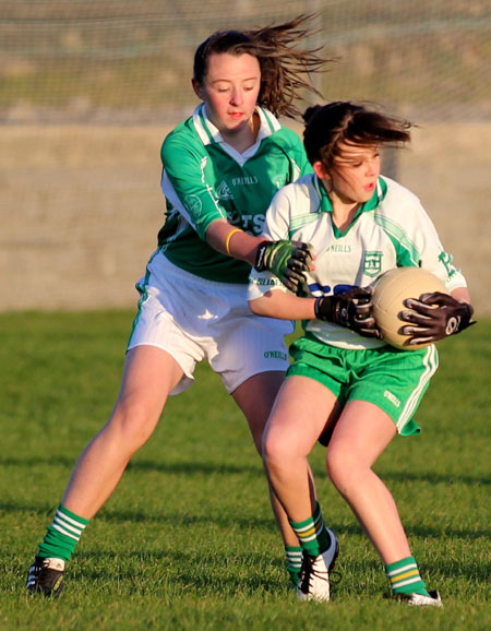 Action from the 2012 ladies under 14 match between Aodh Ruadh and Saint Naul's.