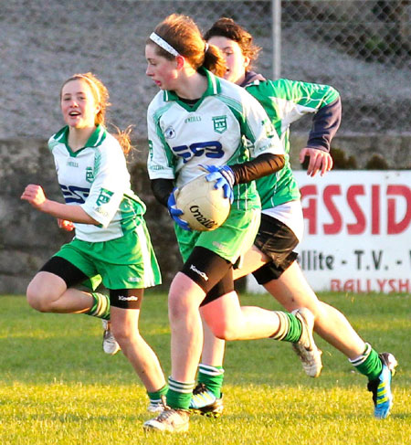 Action from the 2012 ladies under 14 match between Aodh Ruadh and Saint Naul's.