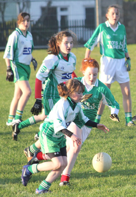 Action from the 2012 ladies under 14 match between Aodh Ruadh and Saint Naul's.