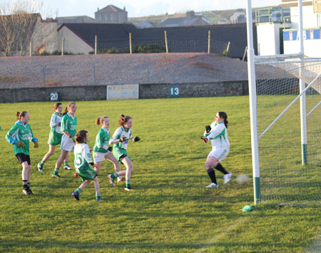 Action from the 2012 ladies under 14 match between Aodh Ruadh and Saint Naul's.