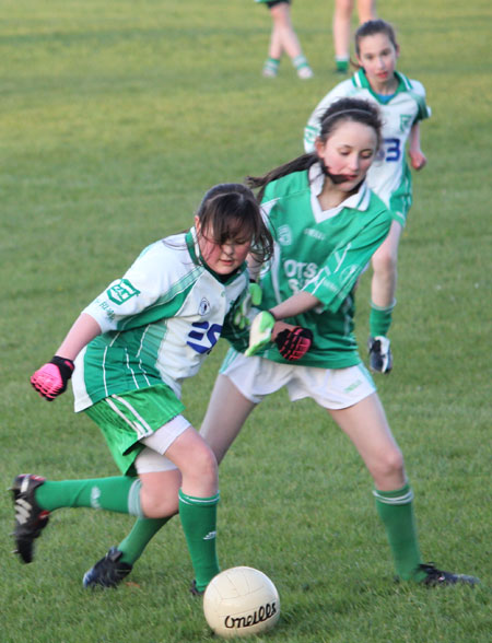 Action from the 2012 ladies under 14 match between Aodh Ruadh and Saint Naul's.