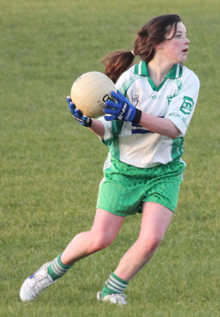 Action from the 2012 ladies under 14 match between Aodh Ruadh and Saint Naul's.