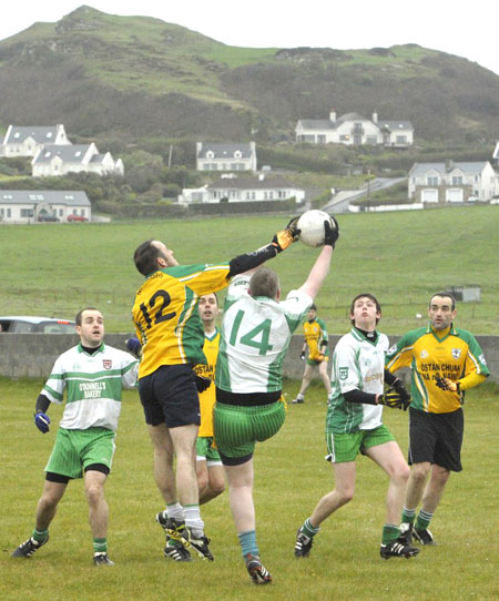 Action from the division three senior reserve football league match against Downings.