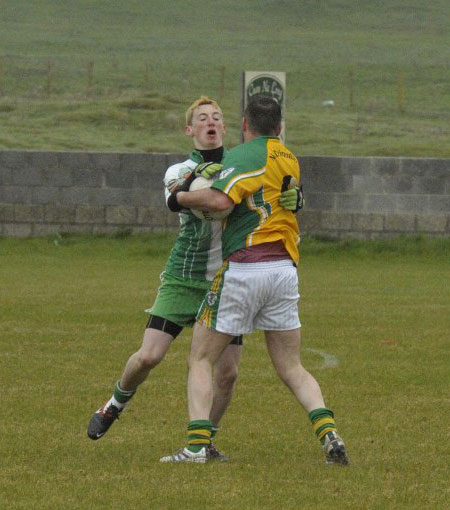 Action from the division three senior reserve football league match against Downings.