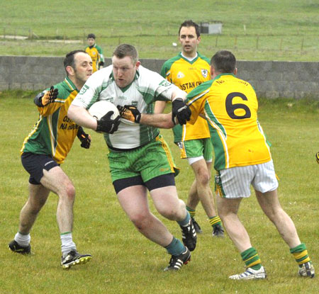 Action from the division three senior reserve football league match against Downings.