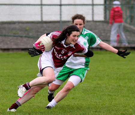 Action from the 2012 ladies under 14 match between Aodh Ruadh and Saint Naul's.