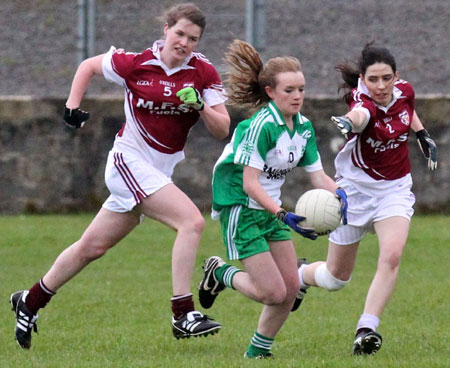 Action from the 2012 ladies under 14 match between Aodh Ruadh and Saint Naul's.