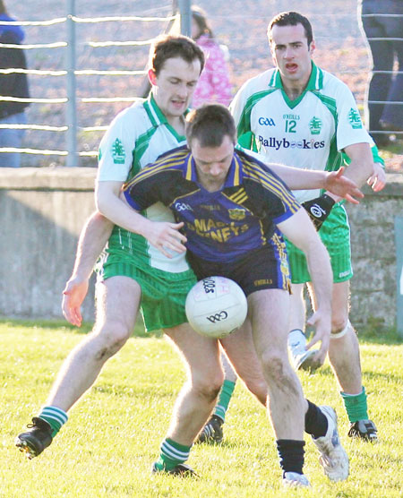 Action from the division three senior football league match against Muff.