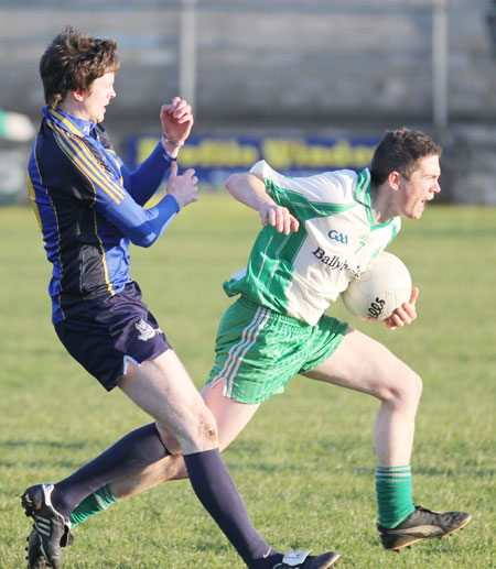 Action from the division three senior football league match against Muff.