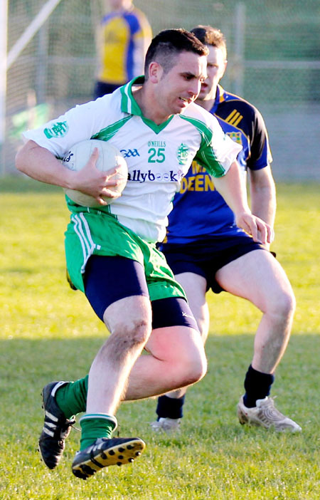 Action from the division three senior football league match against Muff.