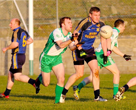 Action from the division three senior football league match against Muff.