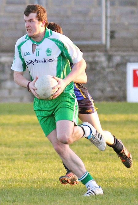 Action from the division three senior football league match against Muff.