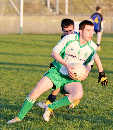 Action from the division three senior football league match against Muff.