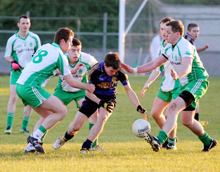 Action from the division three senior football league match against Muff.