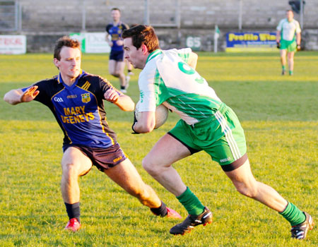 Action from the division three senior football league match against Muff.