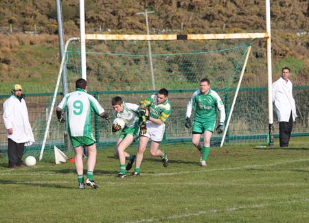 Action from the division three senior reserve football league match against Naomh Columba.