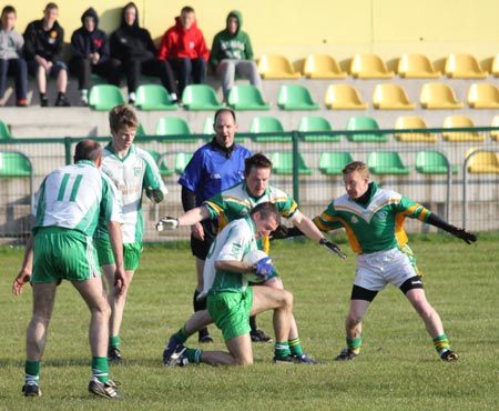 Action from the division three senior reserve football league match against Naomh Columba.