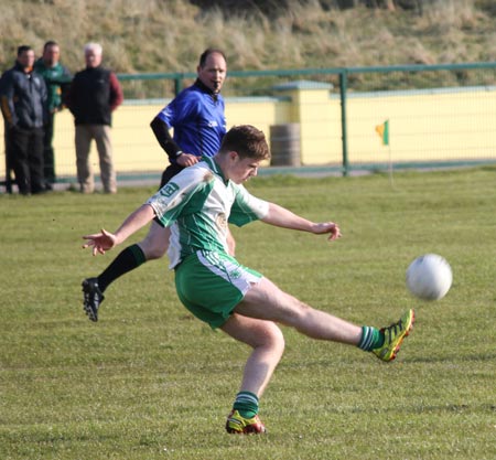 Action from the division three senior reserve football league match against Naomh Columba.