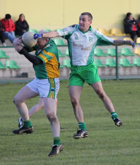 Action from the division three senior reserve football league match against Naomh Columba.