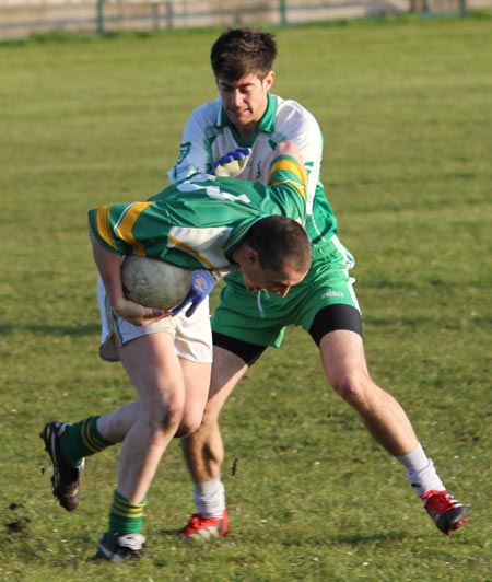 Action from the division three senior reserve football league match against Naomh Columba.