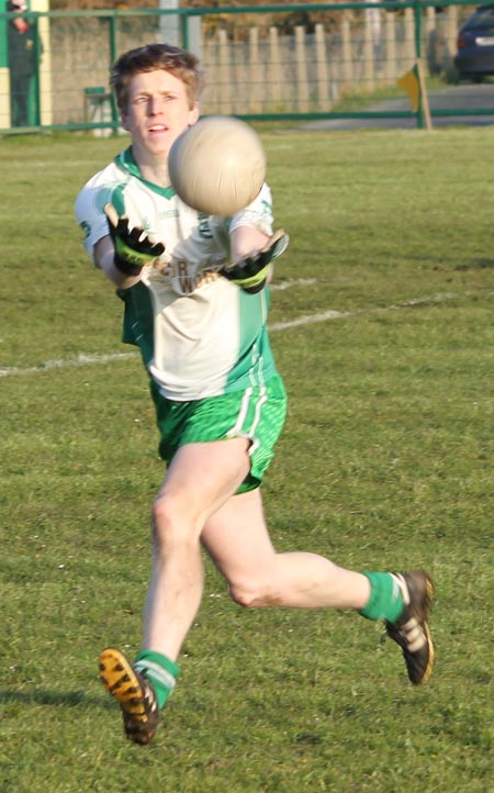 Action from the division three senior reserve football league match against Naomh Columba.