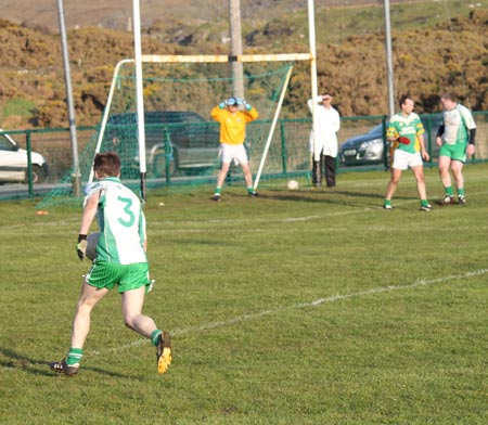 Action from the division three senior reserve football league match against Naomh Columba.